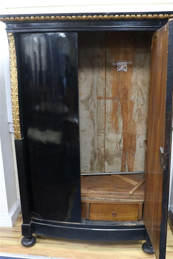 A pair of early 19th Biedermeier ebonised and ormolu cabinets; one a cabinet the other a secretaire a abbatant W.110cm